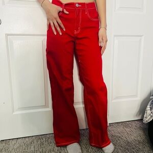 Bright red wide-legged jeans with white stitches by Forever 21